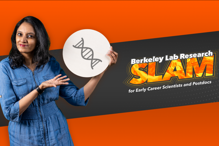 Researcher Aparajitha Srinivasan holds an illustration of DNA in front of the Berkeley Lab Research SLAM logo