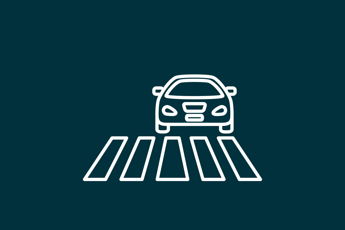 icon of car and crosswalk on blue background