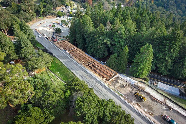 aerial view of bridge construction in progress on Centennial Road