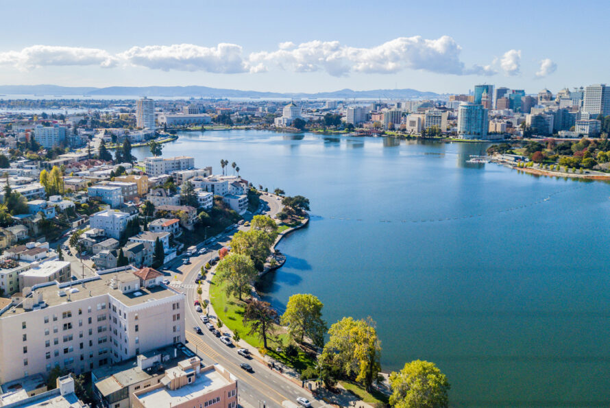 Large lake in urban area surrounded by buildings