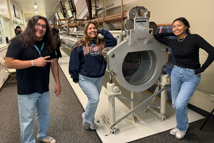 Native American student interns Jonathan Goldtooth, Kaela Henry, and Hannah Nockideneh during a visit to the SLAC National Accelerator Laboratory