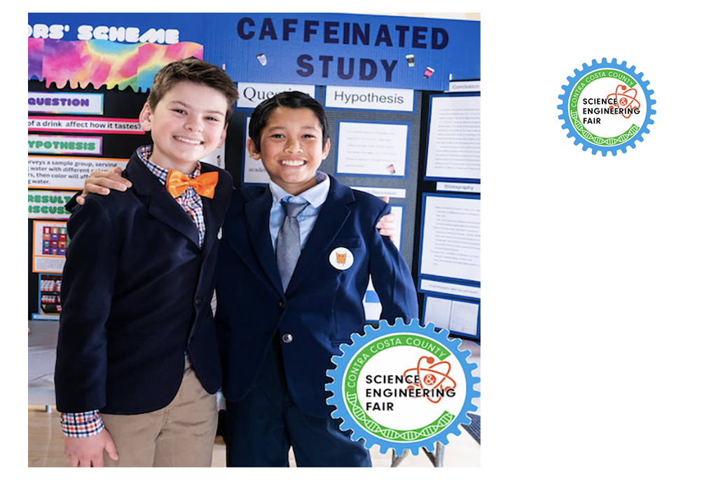 Two young people proudly sharing science fair project