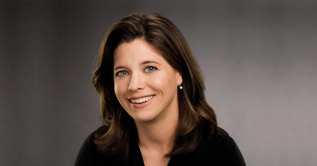 Headshot of person smiling.