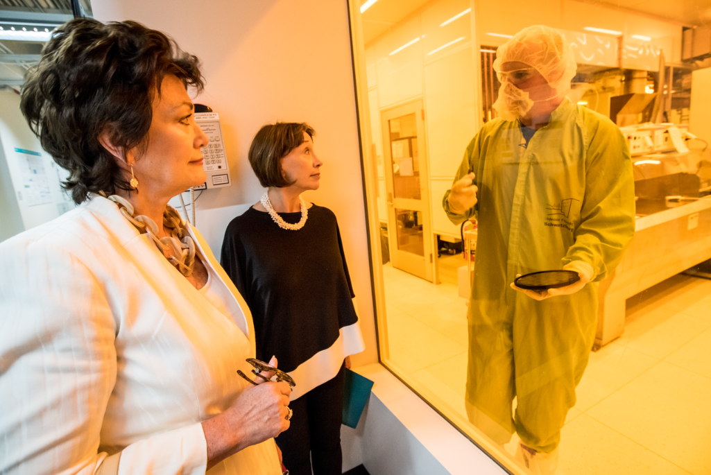 Ellen Tauscher and Charlene Zettel, Regents of the University of California, 2017-2019 and 2009-2021 respectively, peer into the clean room at the Molecular Foundry.
