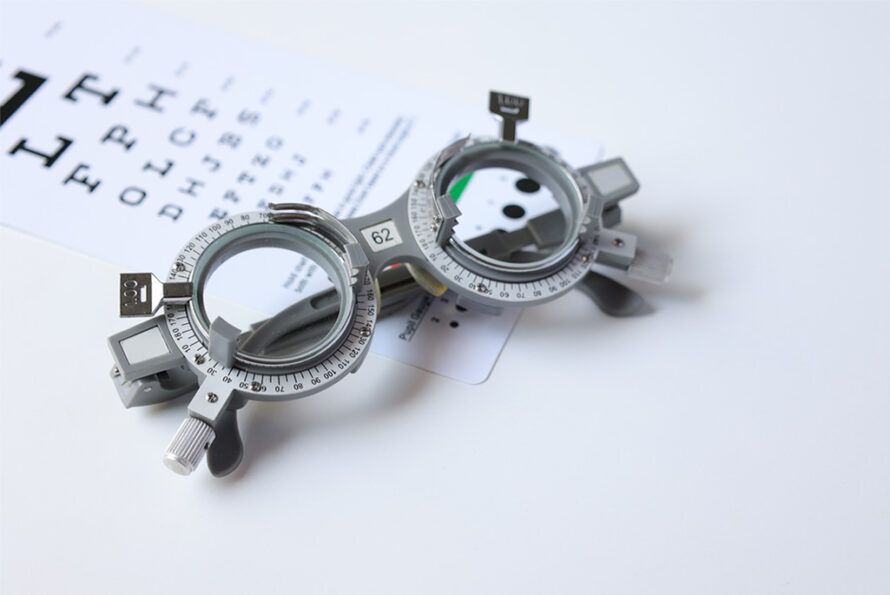 Eyesight measuring instrument with eye chart on a white background.