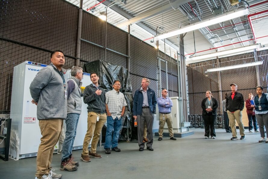 People tour the new Central Chemical Receiving Facility.