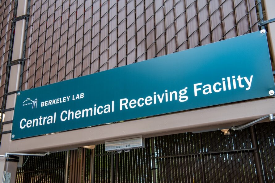 Physical blue sign with the Berkeley Lab logo reads, Central Chemical Receiving Facility.