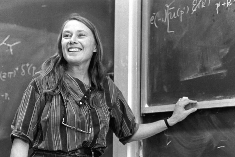 Person standing at blackboard