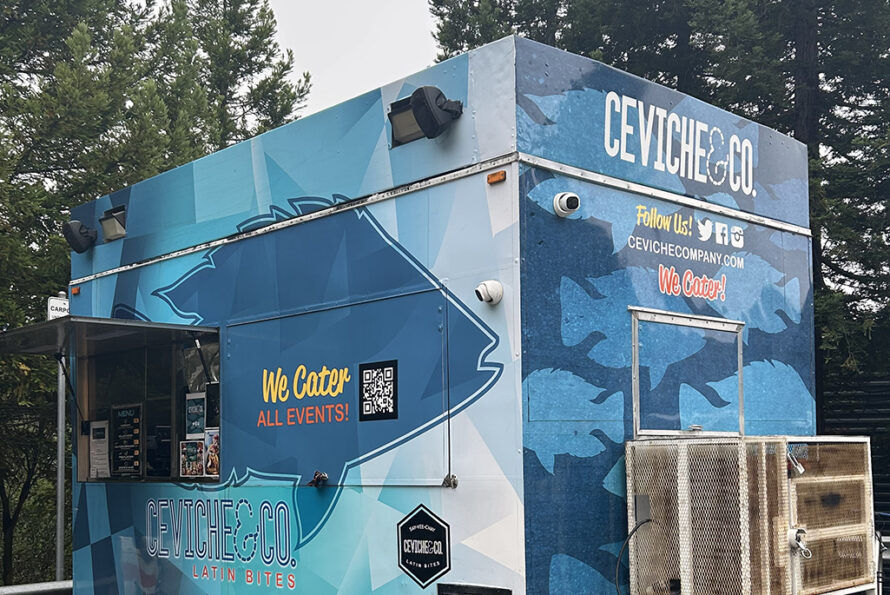 Close up of the blue Ceviche & Co. food truck.