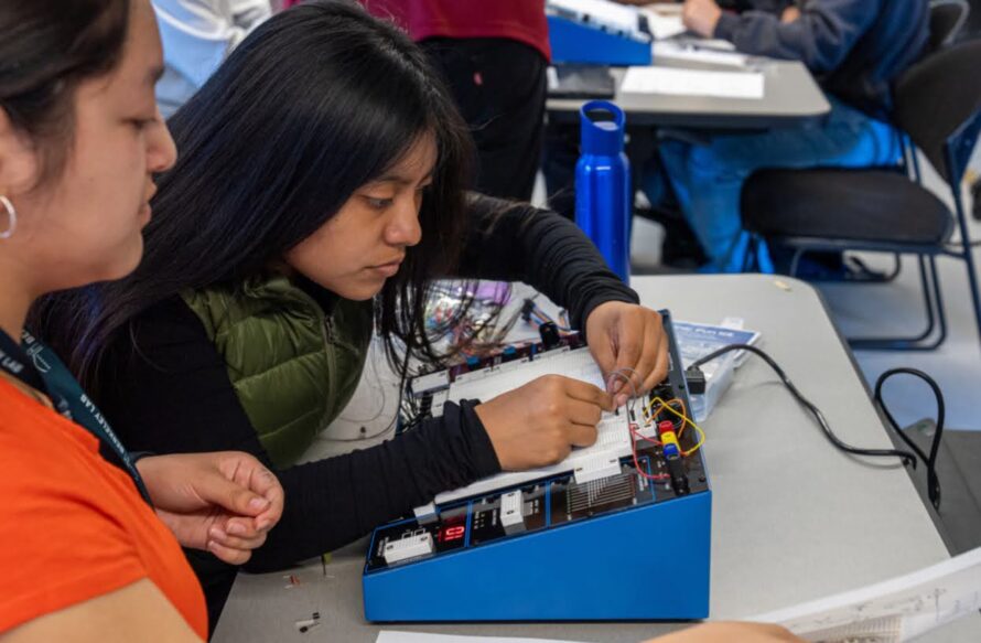 Two students working on electrical circuit