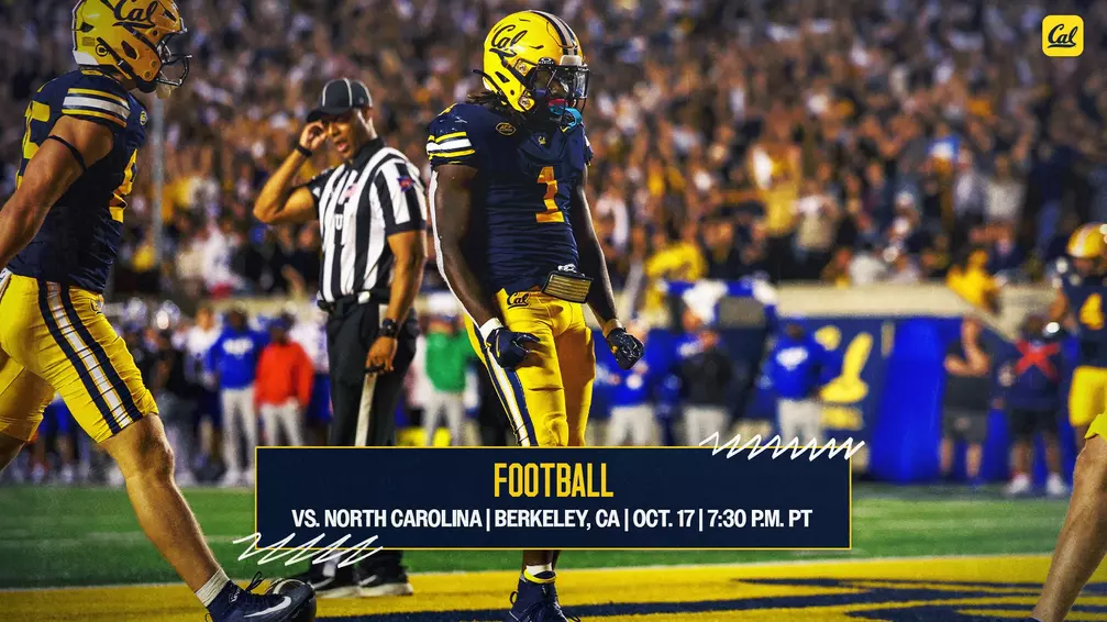 UC Berkeley football player wearing navy blue uniform and gold helmet celebrates in end zone with crowd in background.
