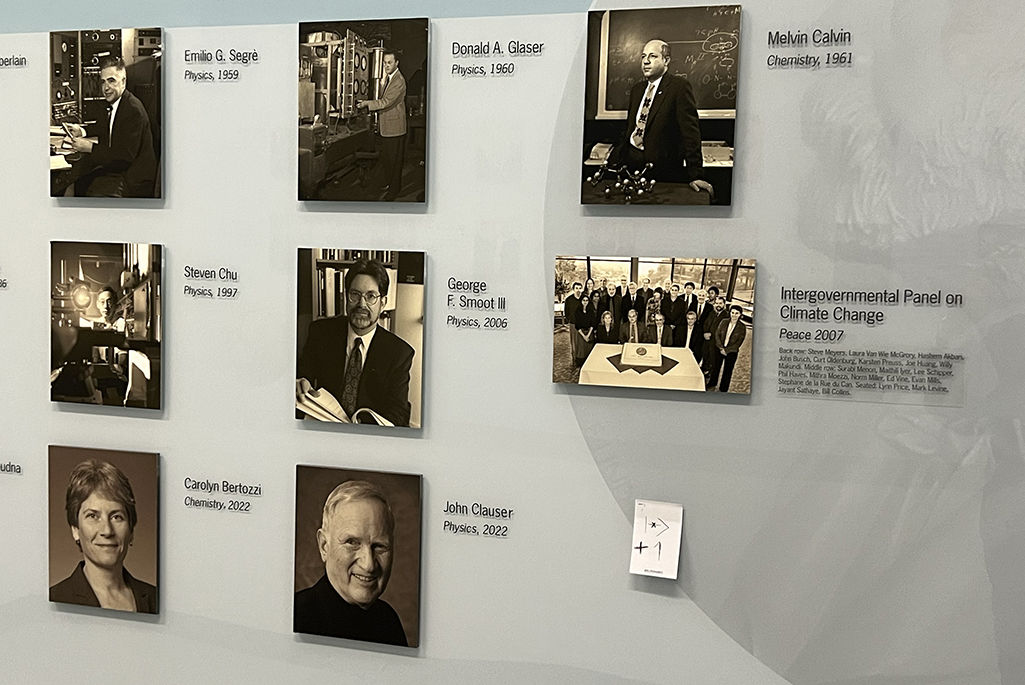 Wall with multiple pictures of people on it