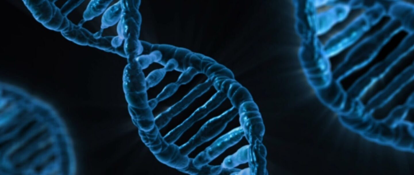 Electron microscopic image of blue DNA double helix structure against black background