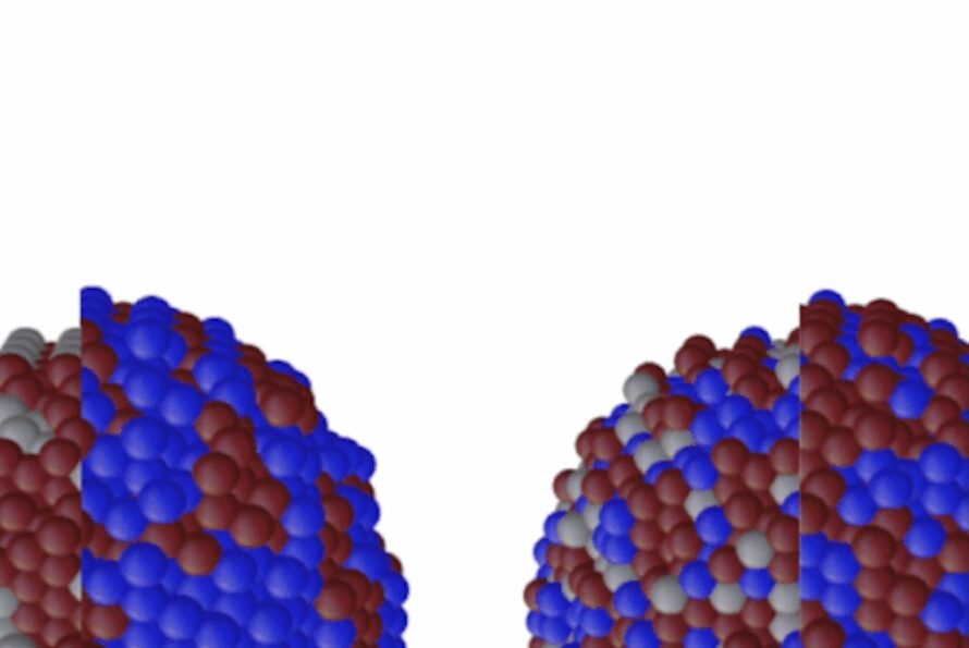 Closeup illustration of two clusters of gray, blue, and maroon spheres representing copper-silver nanoparticles