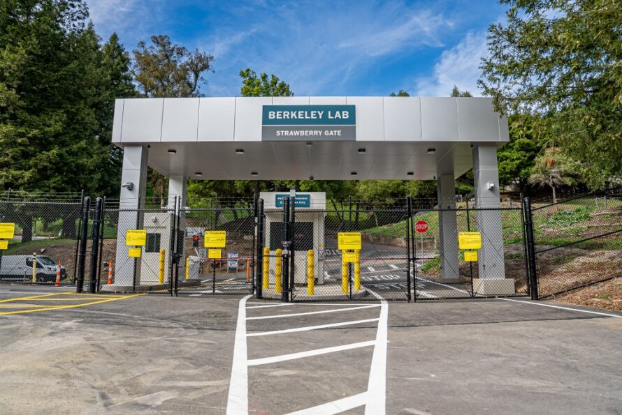 Looking towards campus from Strawberry Gate, with black fences.