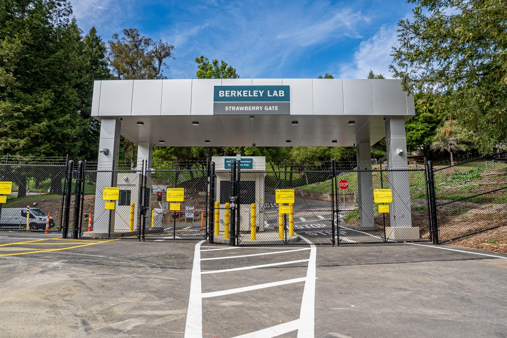 Looking towards campus from Strawberry Gate, with black fences.