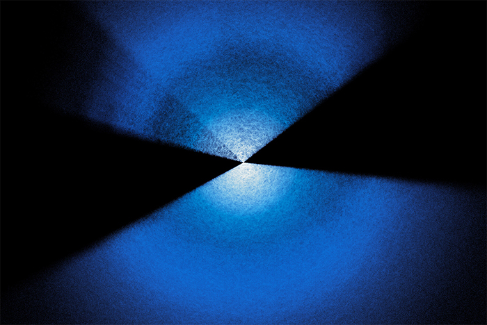Pinpoints of light on a dark blue background.