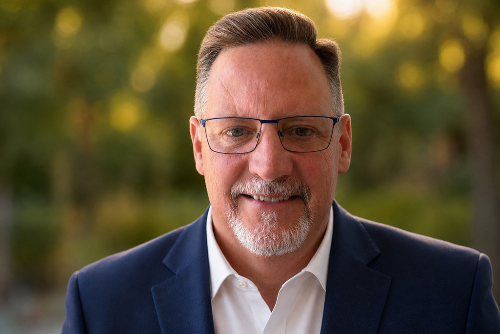Headshot of person wearing glasses