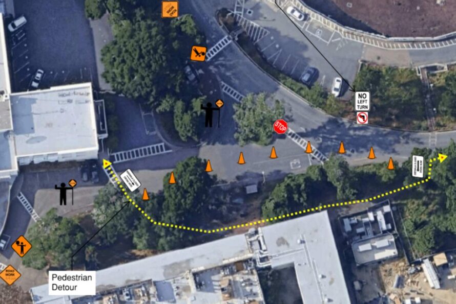 Aerial map view of area near Building 70 with icons indicating pedestrian detours and flaggers.