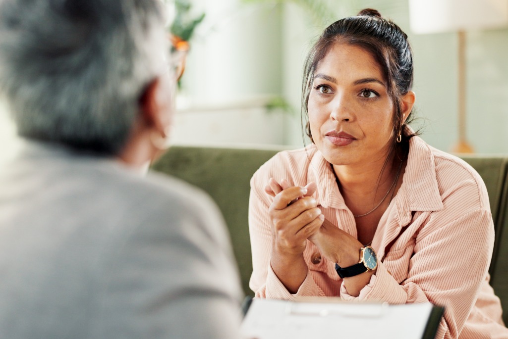 two people in conversation