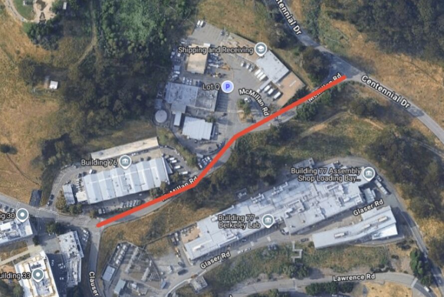 Aerial view of Berkeley Lab with a red line drawn through McMillan Road indicating road closure.