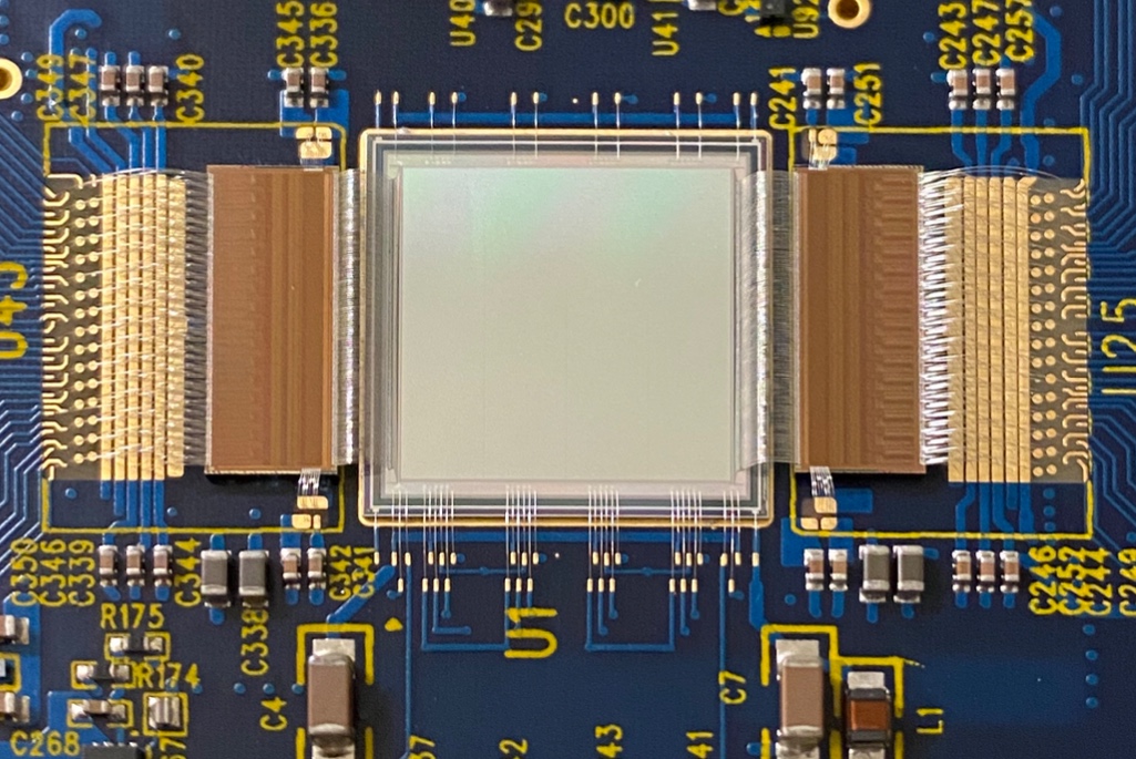 An image sensor and two custom readout chips wire bonded together for the VeryFastCCD project